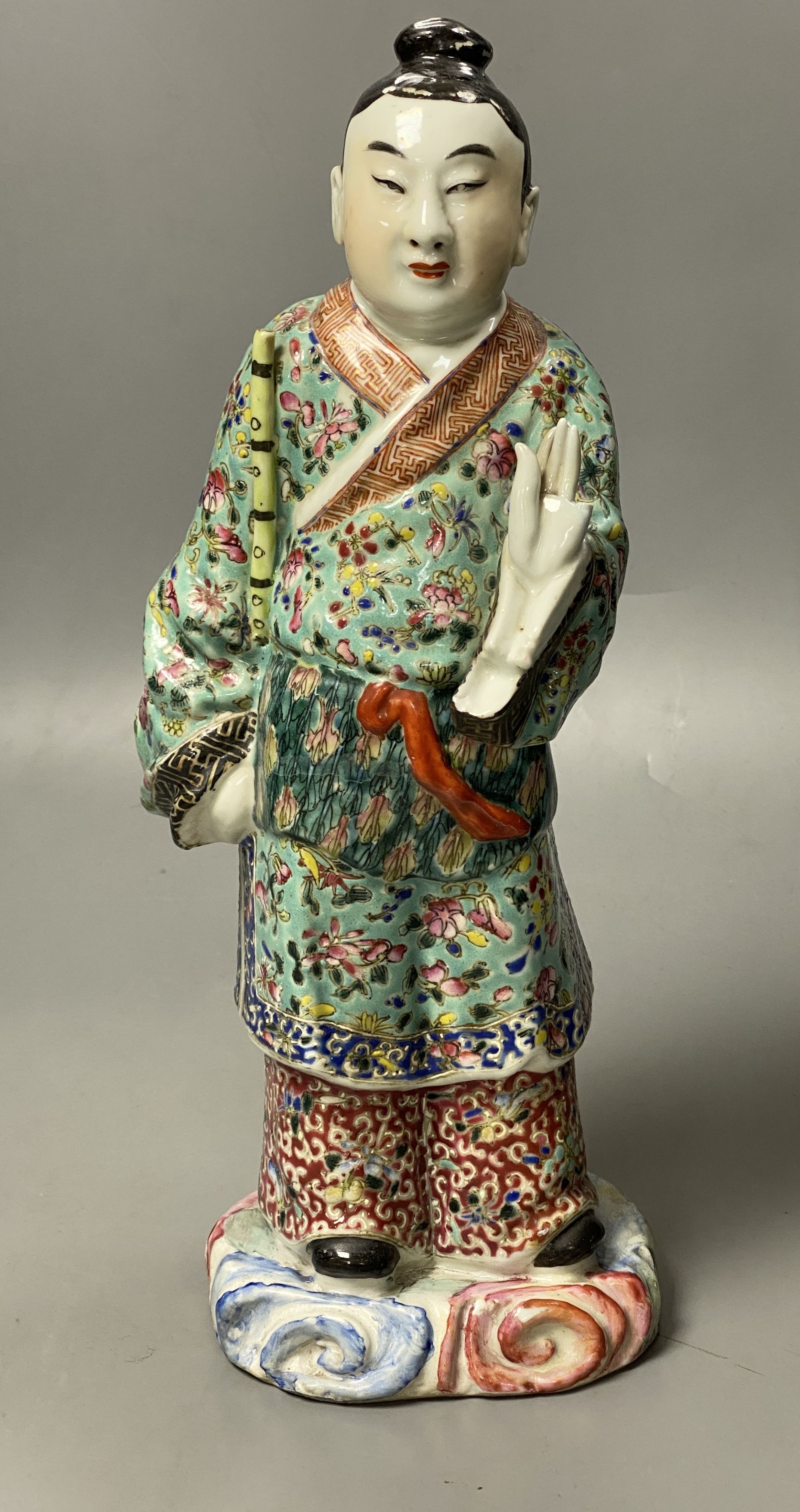 A Chinese famille rose porcelain figure of an immortal, probably Republic period